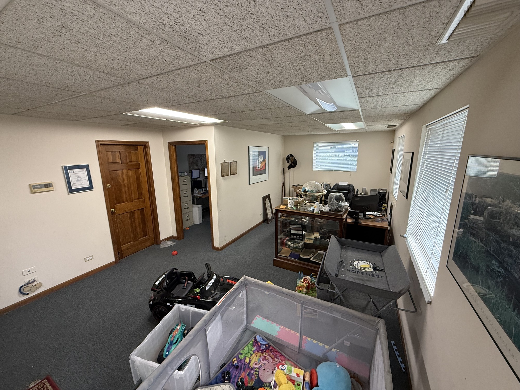 Office area with desks and windows